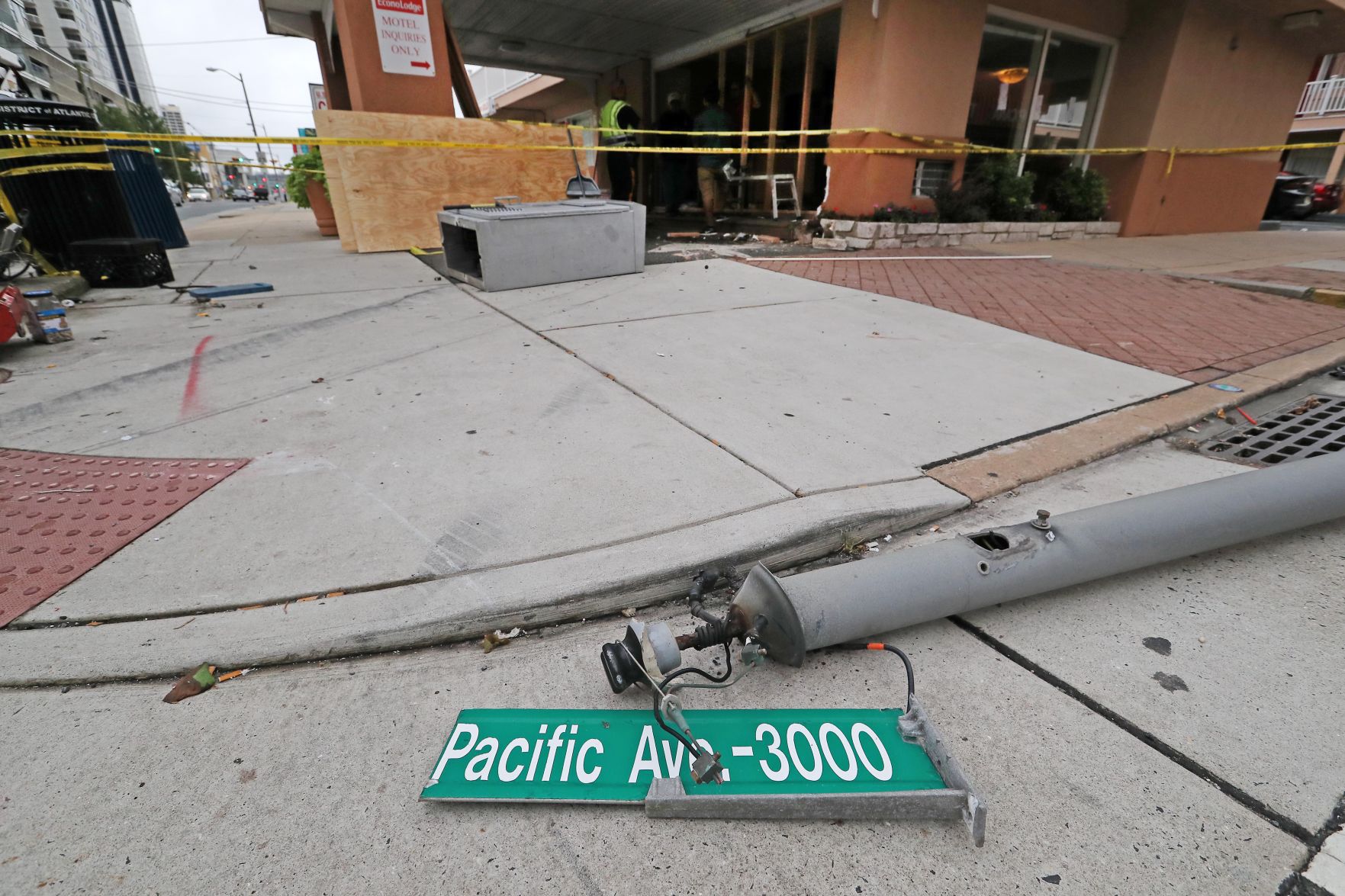 Building damaged from vehicle at Econo Lodge